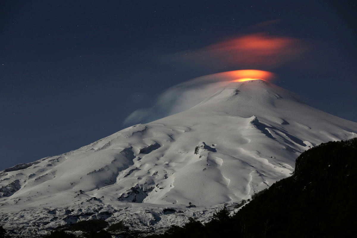 The Villarrica Volcano is seen at night from Pucon town, Chile, September 24, 2018. Picture taken September 24, 2018. REUTERS/Cristobal Saavedra Escobar