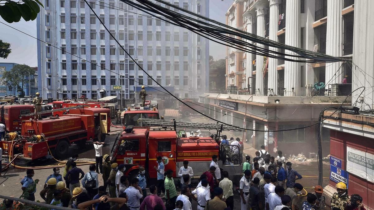 Fire fighters douse a fire which broke out in a building of Calcutta Medical College and Hospital, in Kolkata, Wednesday, Oct 3, 2018. (PTI Photo)