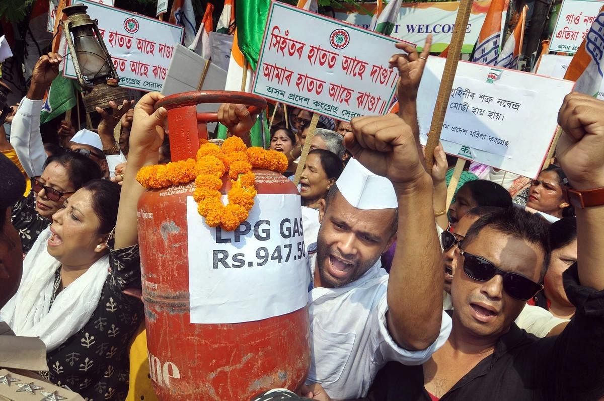 Assam Pradesh Congress Committee (APCC) activists raise slogans in protest against the Central government for hike in fuel prices, in Guwahati, Wednesday, Oct 3, 2018. (PTI Photo)