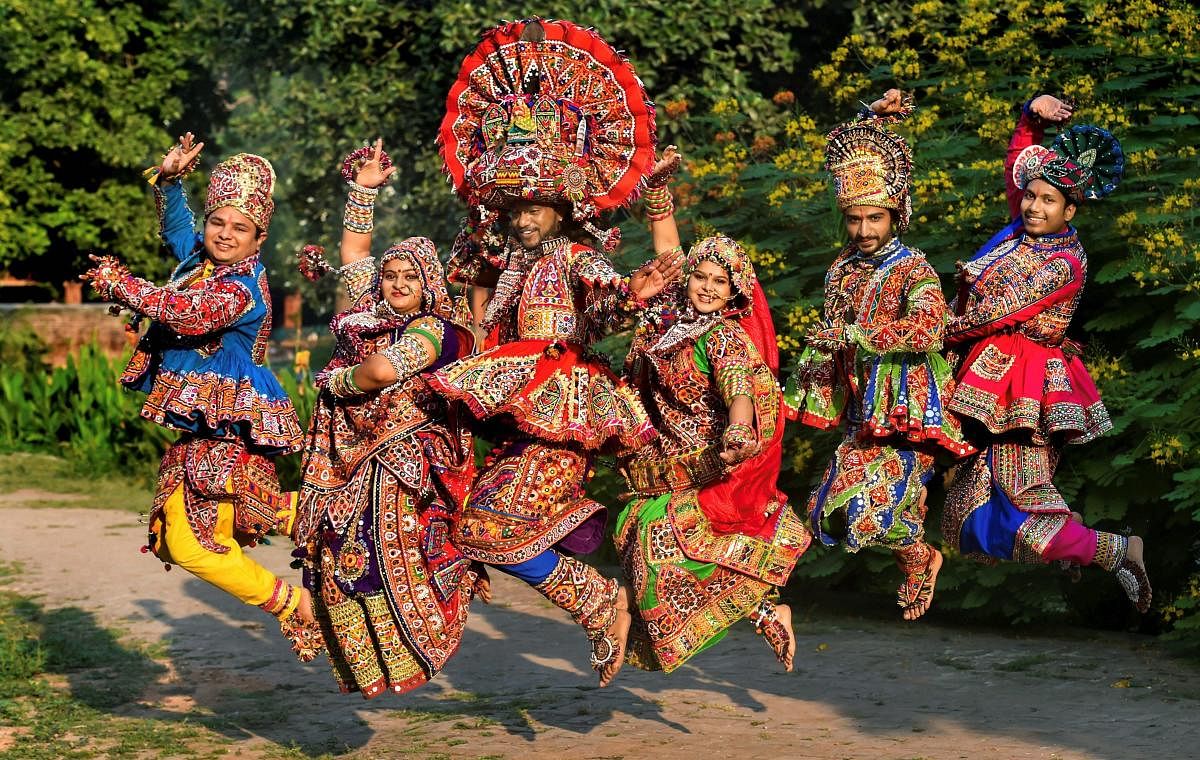 Dancers dressed in traditional attire during the rehearsals for the 'Garba' dance ahead of nine-day Navratri festival, in Ahmedabad. (PTI Photo)