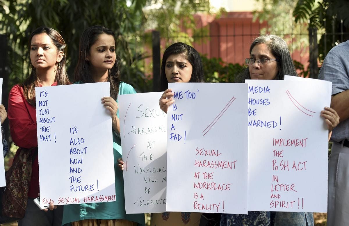 Journalists participate in 'Baatein Aman Ki' campaign led by Women for Peace, at Jantar Mantar in New Delhi. PTI