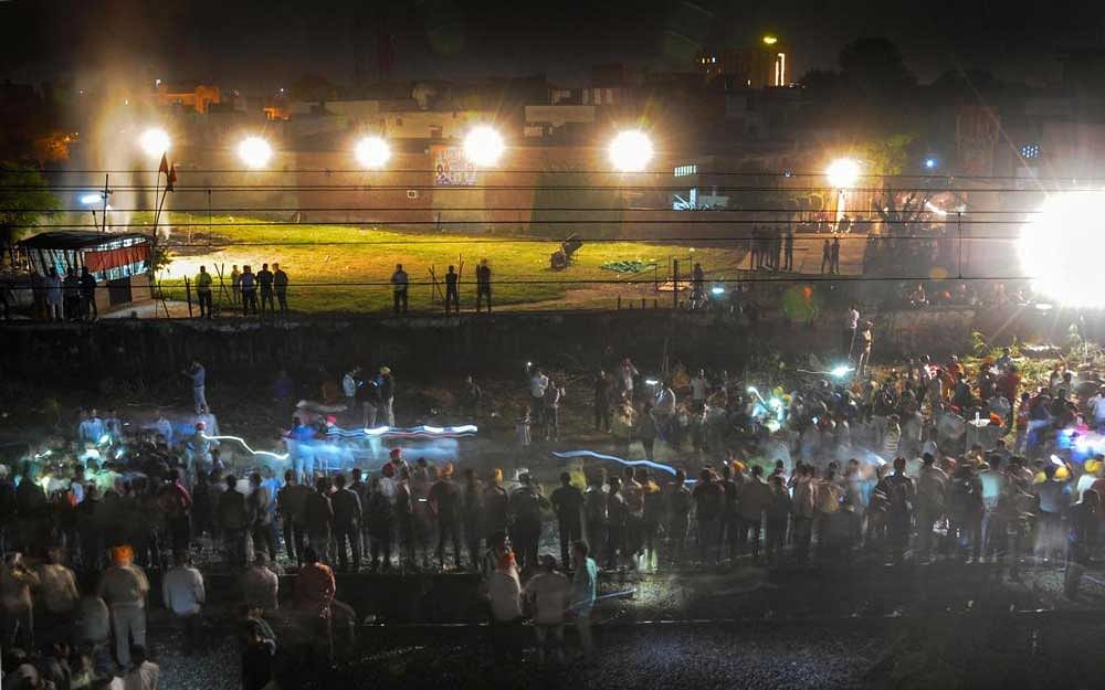 The site of a railway accident near the venue of Dussehra festivities, at Joda Phatak in Amritsar on Friday. Officials said at least 60 bodies have been found and many more injured have been admitted to a government hospital. PTI Photo