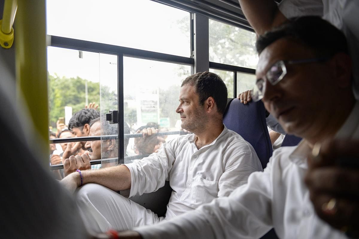 Congress President Rahul Gandhi and other party leaders in a bus after they were detained by the police during a protest against the Centre's move to send CBI Director Alok Verma on leave, outside the CBI headquarters, in New Delhi, Friday, Oct 26, 2018. (PTI Photo)