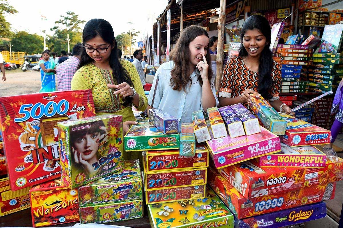 Women buy firecrackers for the festival of Diwali, in Chennai, Sunday, November 4, 2018. (PTI Photo)