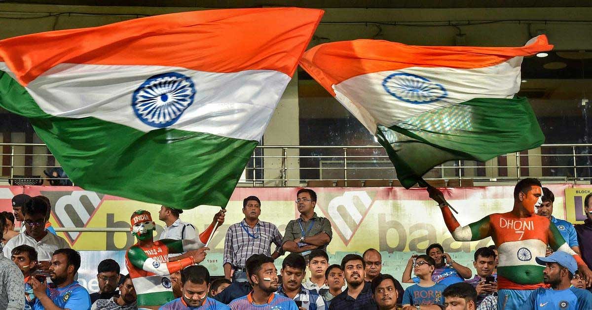 Indian suporters wave tri-colours during the 1st T20I match against West Indies at Eden Garden in Kolkata, Sunday, Nov 4, 2018. (PTI Photo/Ashok Bhaumik)