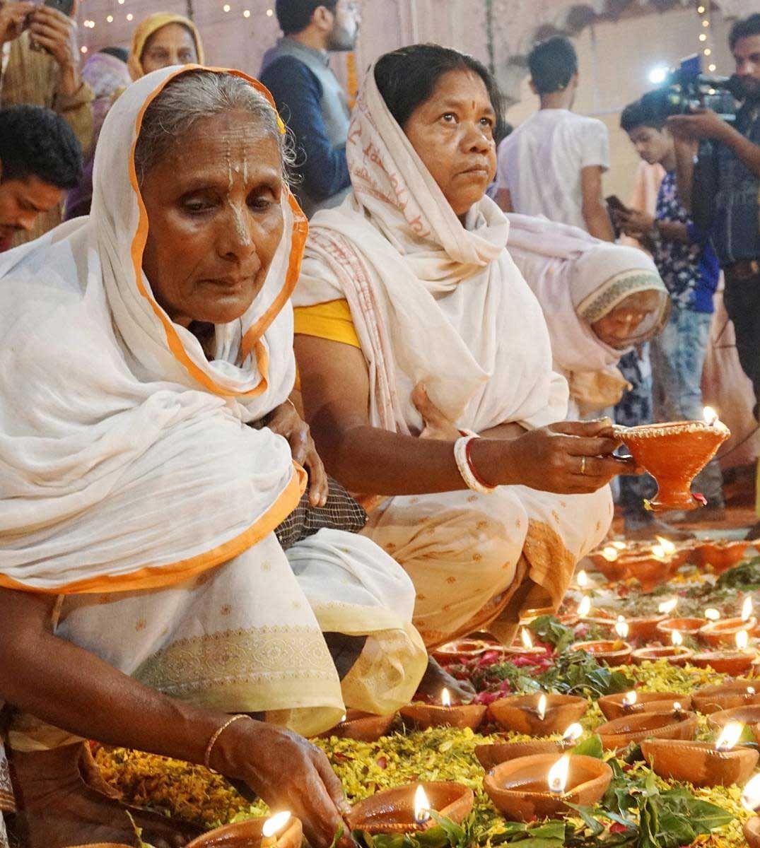 Widows of Vrindavan celebrate Diwali at Gopinath Temple in Vrindavan, Sunday, Nov 4, 2018. (PTI Photo)