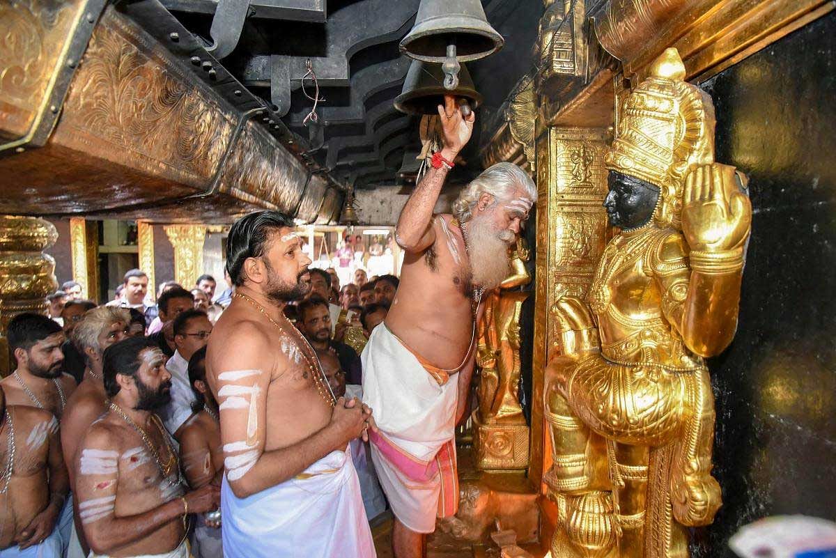 Temple priests offer prayers at Sabarimala Temple, Monday, Nov 05, 2018. This is the second time the hill temple opened for 'darshan' after the Supreme Court allowed entry of women of all age groups into it. (PTI Photo)