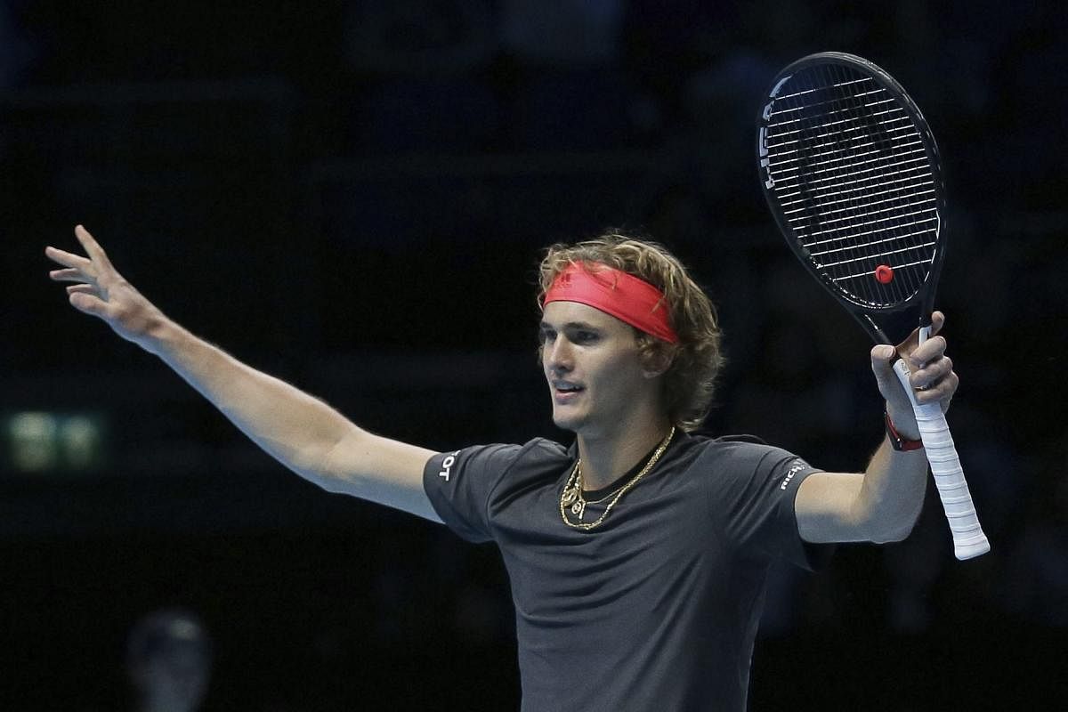 Alexander Zverev of Germany celebrates winning match point against John Isner of the United States in their ATP World Tour Finals singles tennis match at the O2 Arena in London. AP/PTI photo