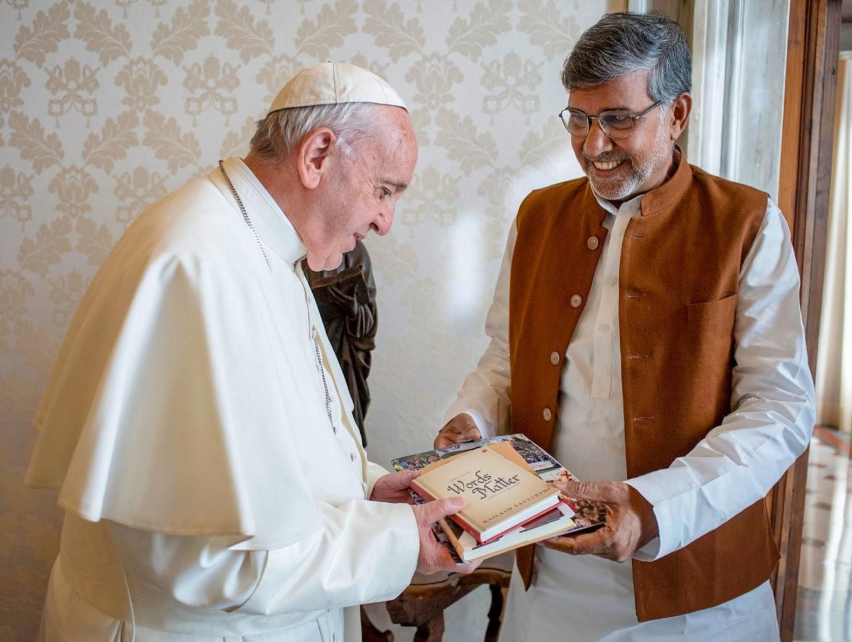Nobel Peace Laureate Kailash Satyarthi meets Pope Francis during a call on, in Vatican City. PTI photo