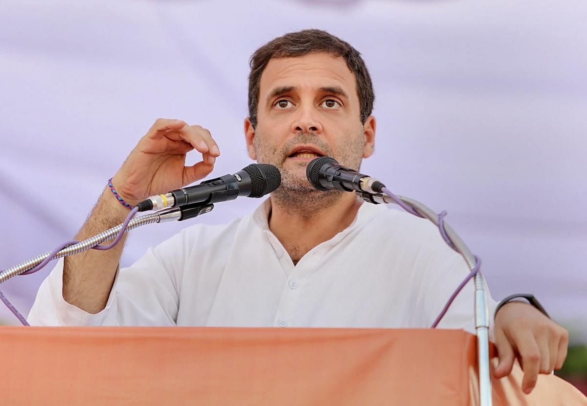 Congress President Rahul Gandhi addresses a public rally at Mahatma Gandhi Stadium Ground ahead of the State Assembly elections in Mandla district. PTI photo