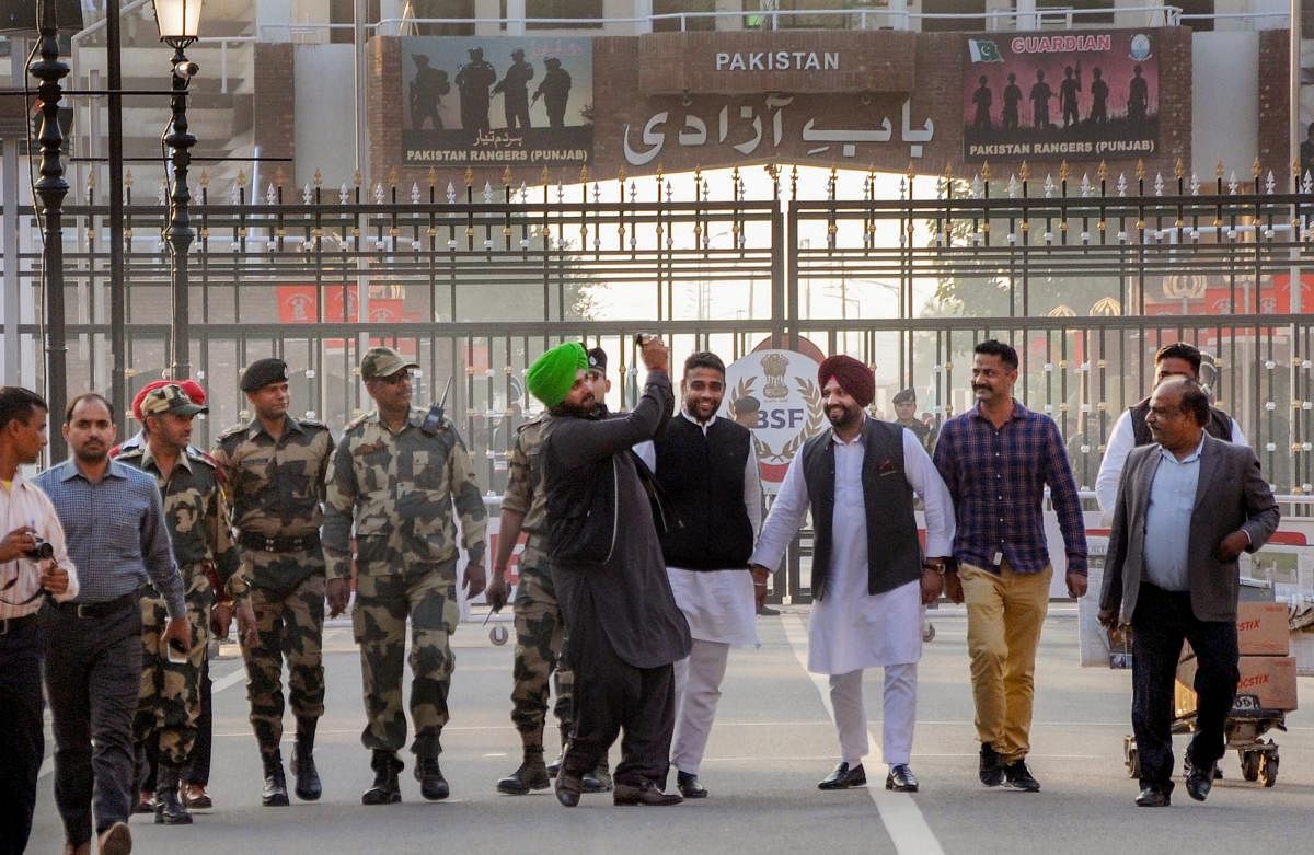 Attari: Punjab Cabinet Minister Navjot Singh Sidhu arrives after attending the groundbreaking ceremony for the Kartarpur Corridor, at the India-Pakistan Wagah Post, about 35km from Amritsar, Thursday, Nov. 29, 2018. (PTI Photo)