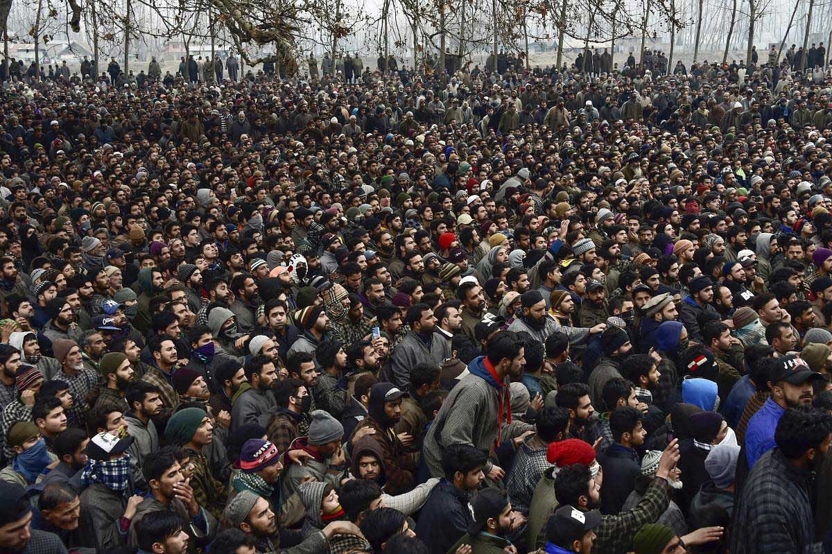 Villagers gather for the joint funeral prayers of Lashkar-e-Toiba (LeT) militants Saqib Bilal Sheikh (17) and Mudasir Rashid Parray (14) at Hajin of Bandipora district, Kashmir, Monday, Dec. 10, 2018. Three LeT militants were killed in a gun battle with security forces on Sunday. ( PTI Photo)