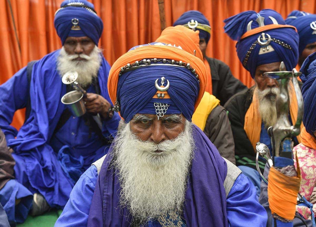 Nihang or Sikh religious warriors participate in a protest during 'Janta Ki Awaz' (New Alternative Save Democracy) on International Human Rights Day at Jantar Mantar, in New Delhi, Monday, Dec. 10, 2018. (PTI Photo)