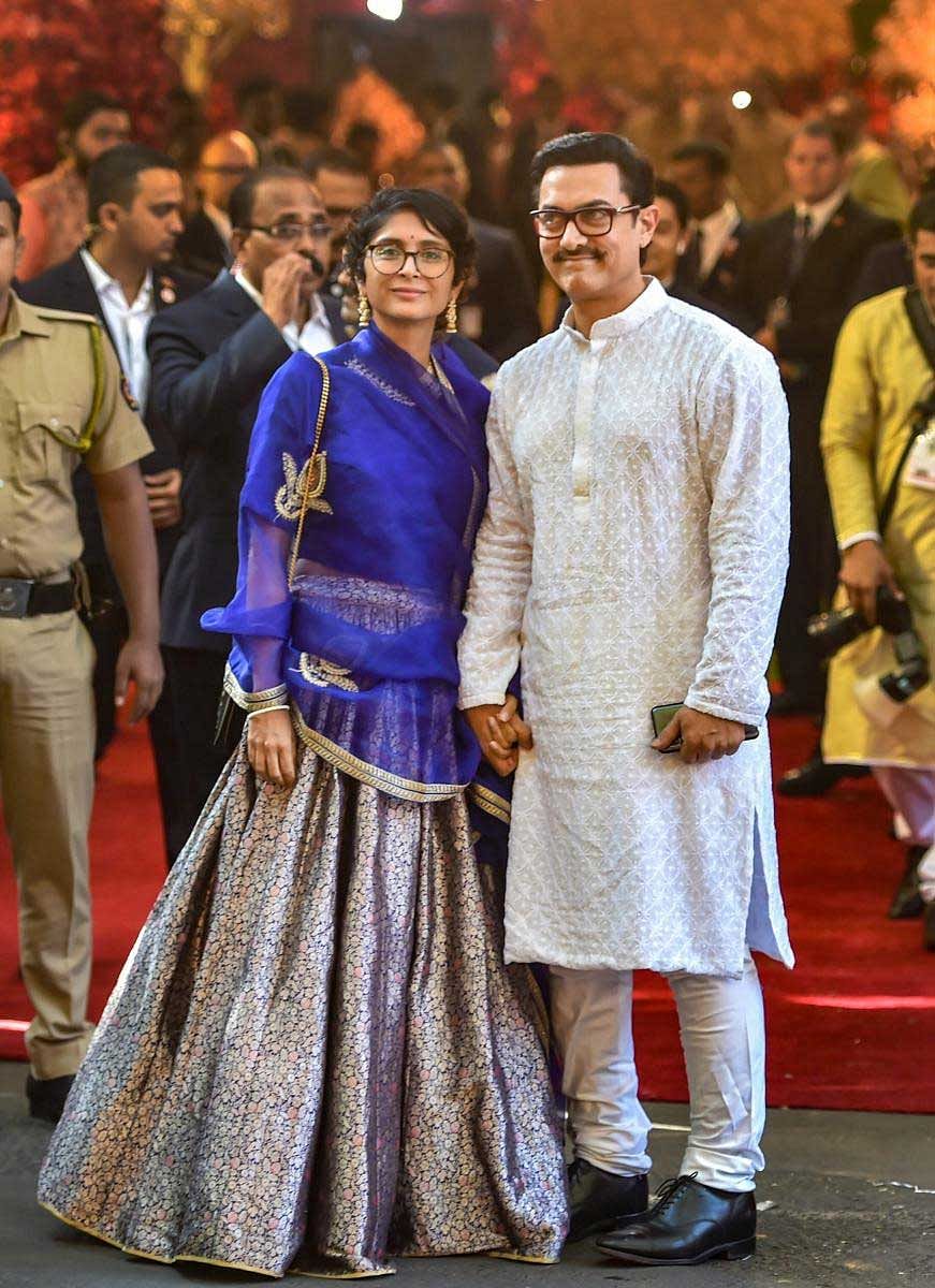 Bollywood actor Aamir Khan with wife-producer Kiran Rao attends the wedding ceremony of industrialist Mukesh Ambani's daughter Isha with Anand Piramal at Ambani's residence, Antilia, in Mumbai, Wednesday, Dec. 12, 2018. (PTI Photo)