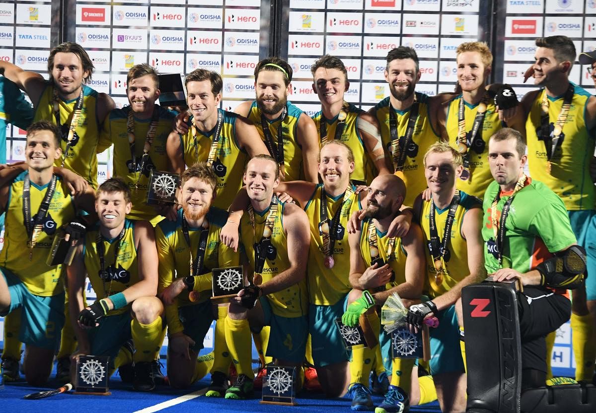 Australia's players pose for photograph with their bronze medal after their field hockey bronze medal match between England and Australia at the 2018 Hockey World Cup in Bhubaneswar on December 16, 2018. (AFP)