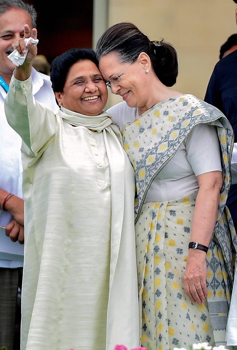 Congress leader Sonia Gandhi and Bahujan Samaj Party (BSP) leader Mayawati during the swearing-in ceremony of JD(S)-Congress coalition government in Bengaluru on May 23.