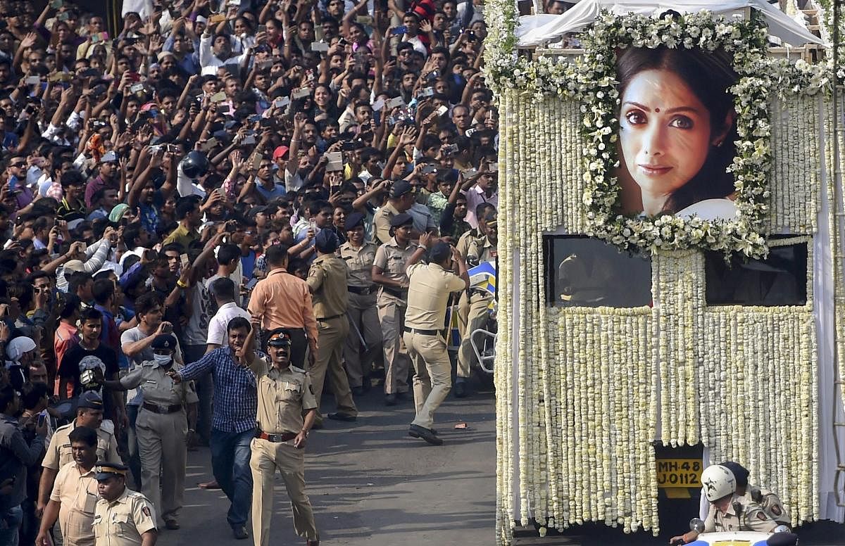 People gather in large number to pay their respect during the funeral procession of actor Sridevi, in Mumbai on February 28. Dubai Government revealed Sridevi had drowned in the hotel bathtub after losing consciousness.