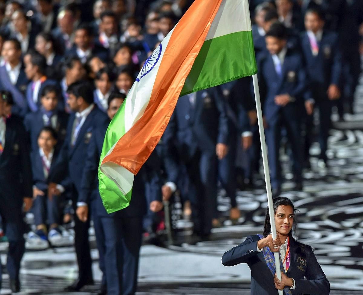 Flagbearer PV Sindhu leads the Indian contingent at Carrara Stadium during the opening ceremony of 2018 Commonwealth Games, Gold Coast in Australia, on April 4.