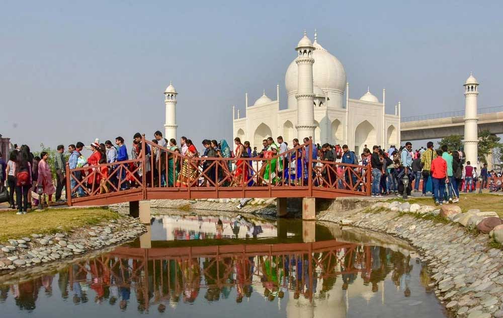 People visit the replica of Taj Mahal at Echo Park, Rajarhut-New Town city near Kolkata. PTI Photo