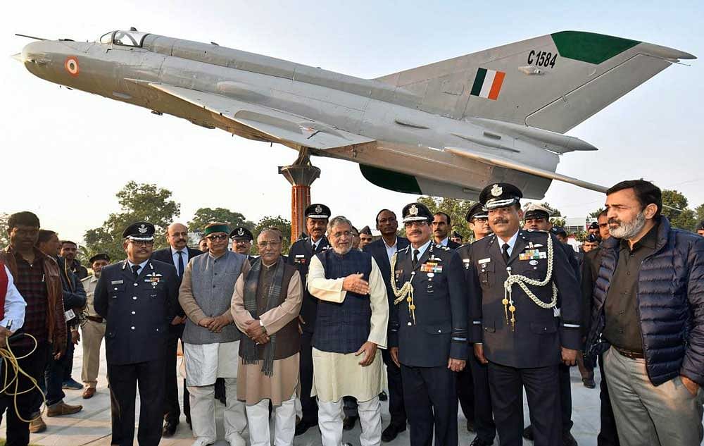 Bihar Deputy Chief Minister and senior BJP leader Sushil Kumar Modi with Air Marshal B P Sinha Air Officer Commanding-in Chief, HQ, CAC, IAF during the inauguration of MiG-21 fighter aircraft at Rajdhani Vatika phase-3, in Patna. PTI Photo