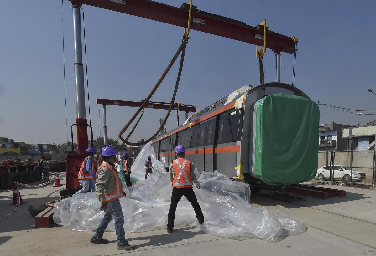 Metro train coaches for Metro-Link Express for Gandhinagar and Ahmedabad (MEGA) on their arrival in Ahmedabad. PTI