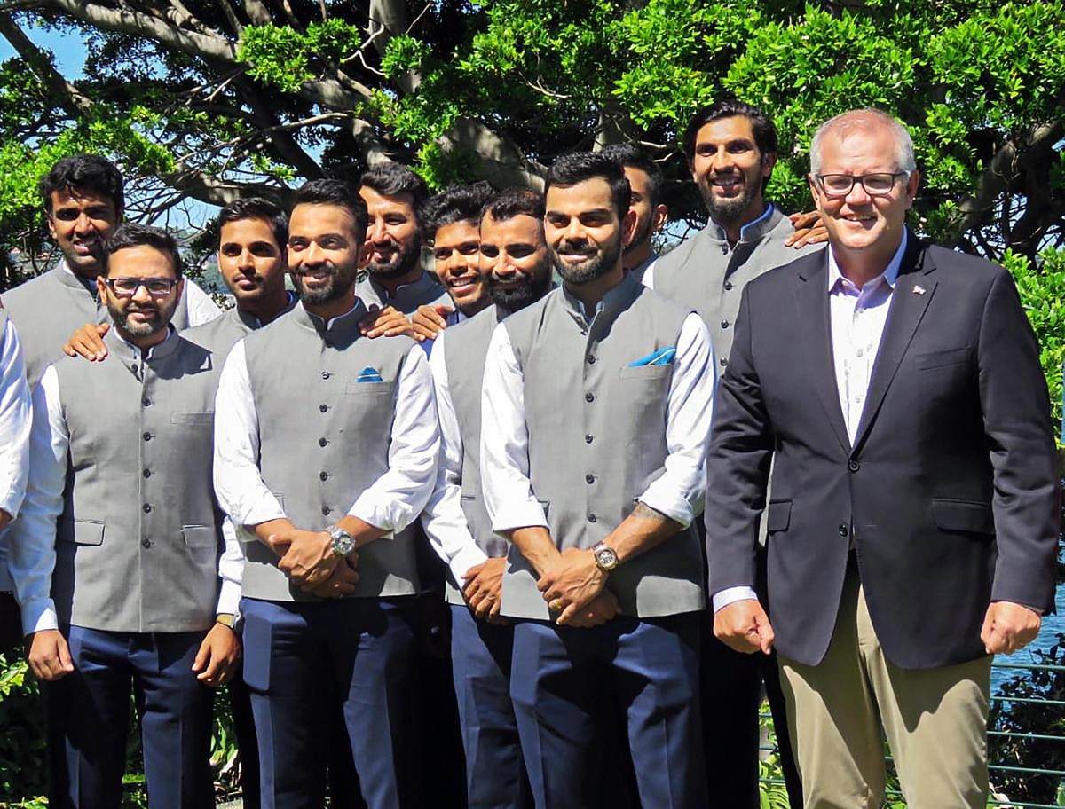 Australian Prime Minister Scott Morrison (R) with skipper Virat Kohli and other Team India players at his official residence, the Kirribilli House in Sydney on the New Year's day. PTI/Twitter