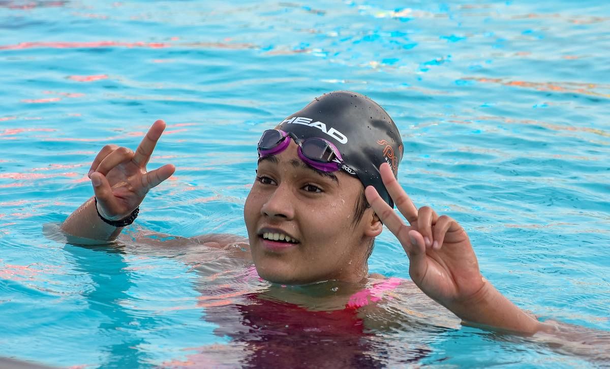 Delhi's Prachi Tokas reacts after winning gold medal in U-17 Girls 1500 Mtr Freestyle Swimming event at Khelo India Youth Games 2019 in Pune. PTI photo