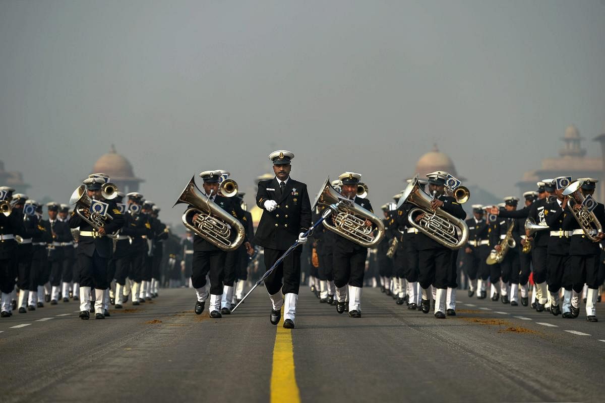 Indian Coast Guard personnel march during the rehearsals for the upcoming Republic Day parade 2019 on a cold morning, at Rajpath in New Delhi. PTI photo