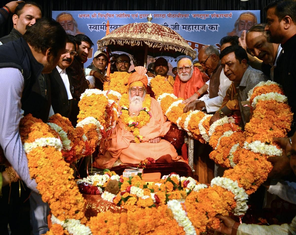 Shankaracharya Swami Swaroopanand Saraswati being garlanded during the 71th vocation daksha ceremony in Jabalpur. PTI photo