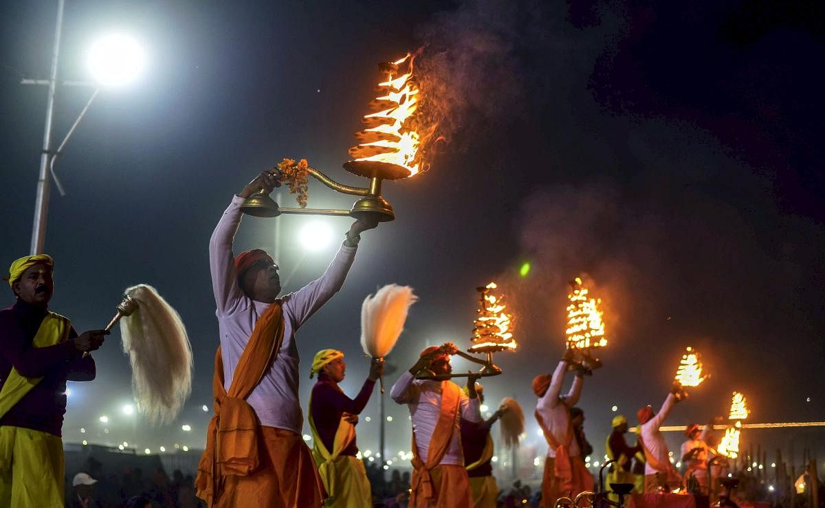Priest perform Ganga Aarti on the eve of Paush Purnima festival during ongoing Kumbh Mela 2019 in Allahabad. (PTI Photo)
