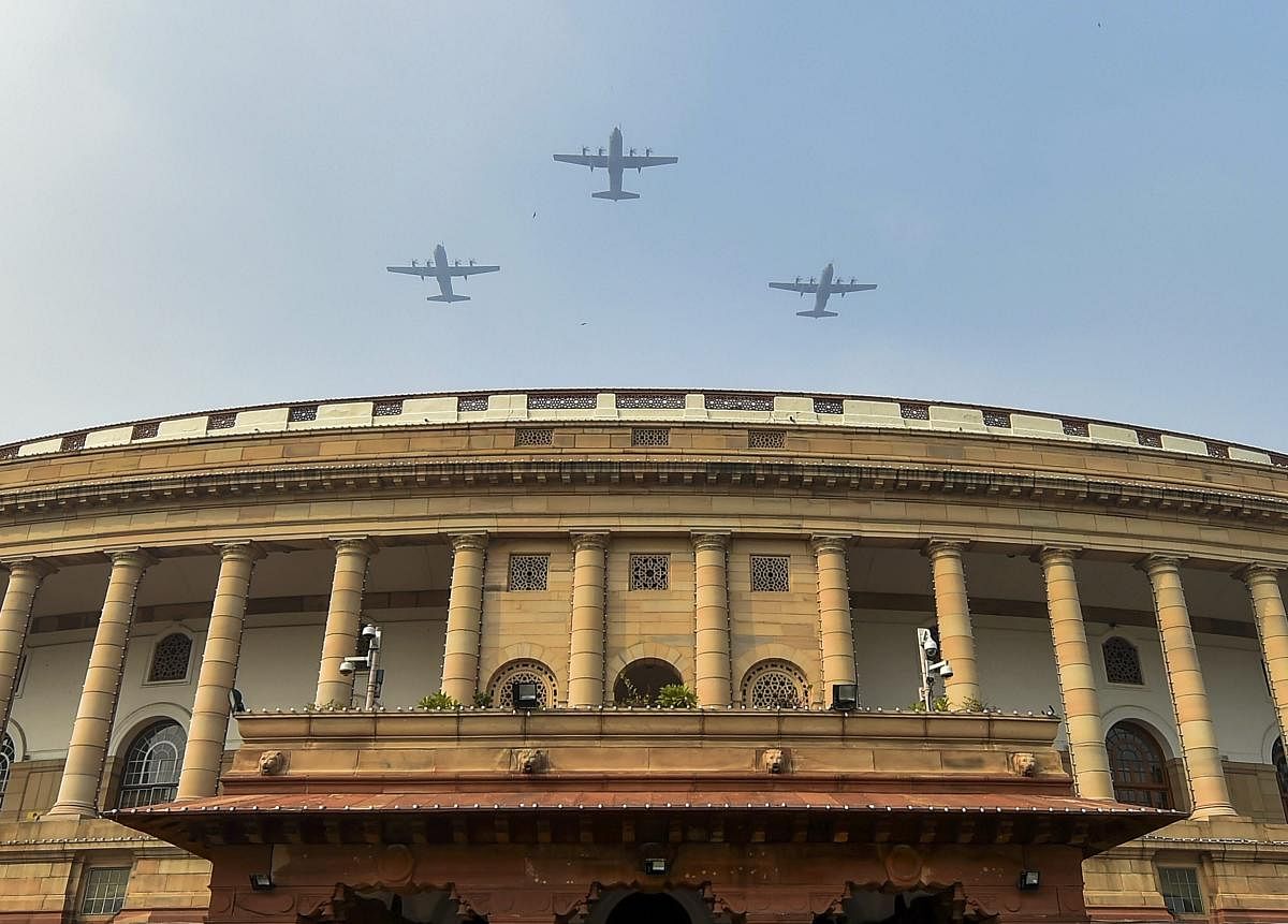 Indian Air Force's C-130 Hercules planes fly past over the Parliament House during full dress rehearsal for the Republic Day Parade in New Delhi. (PTI Photo/Kamal Kishore)