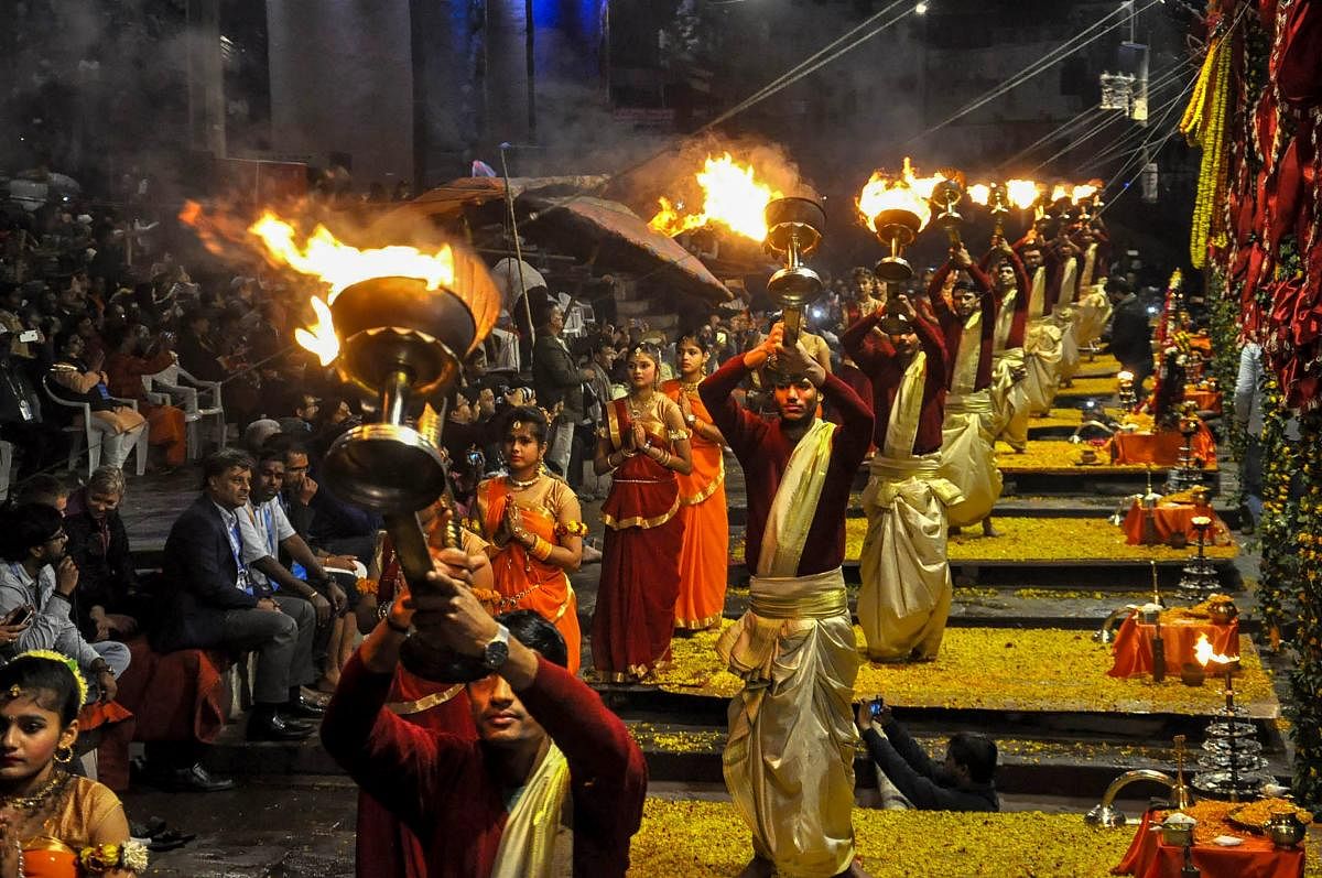 Priests perform 'Maha Aarti' during Kumbh Mela 2019 at Dashashwamedh Ghat, in Allahabad. (PTI Photo)
