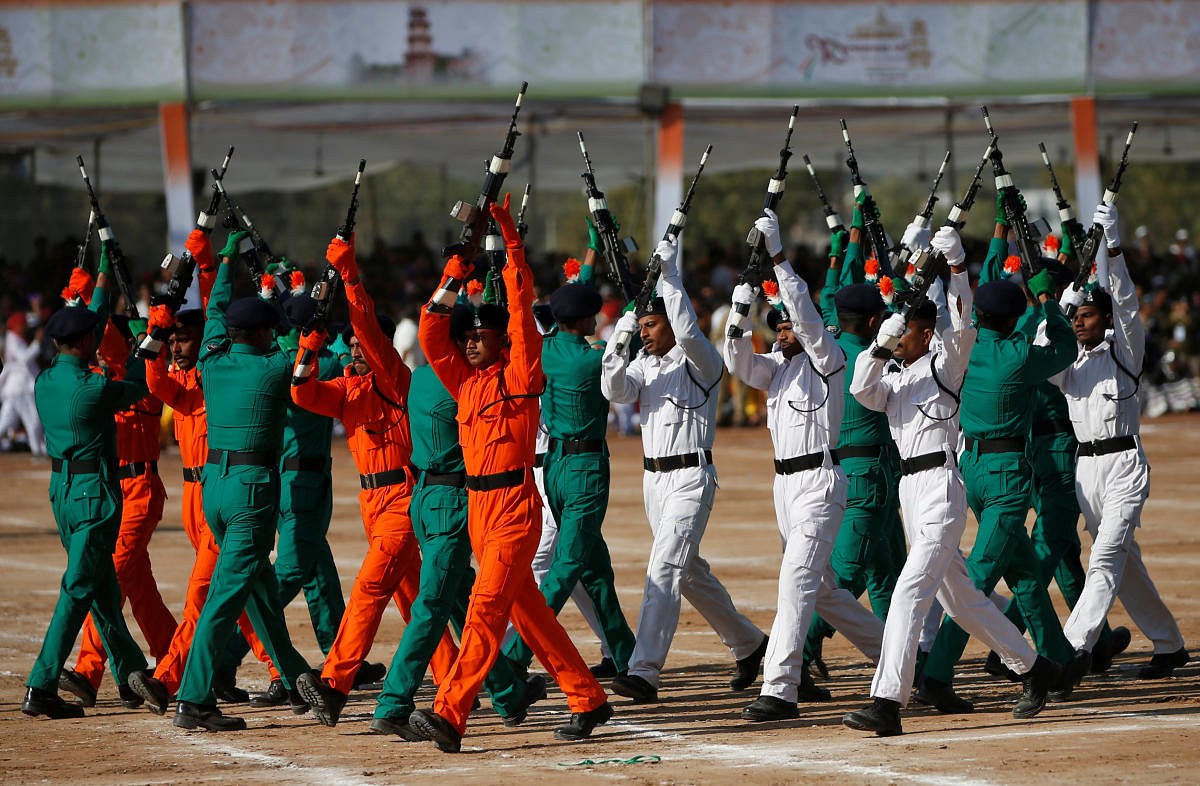 Policemen hold their guns as they perform during Republic Day celebrations in Palanpur, January 26, 2019. REUTERS