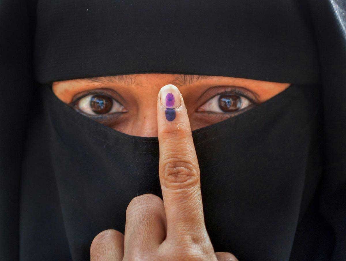 A woman shows her finger marked with indelible ink after casting her vote for the Malkapur Municipal Council election at Malkapur, in Karad, Sunday, Jan 27, 2019. (PTI Photo)