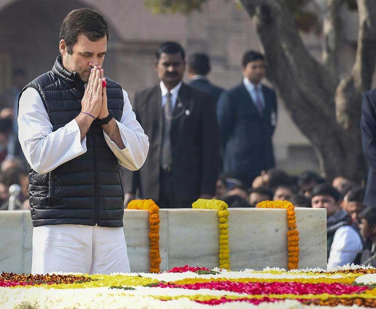 Congress President Rahul Gandhi pays homage to Mahatma Gandhi on his 71st death anniversary, also observed as Martyrs' Day, at Rajghat in New Delhi, Wednesday, Jan. 30, 2019. (PTI Photo)