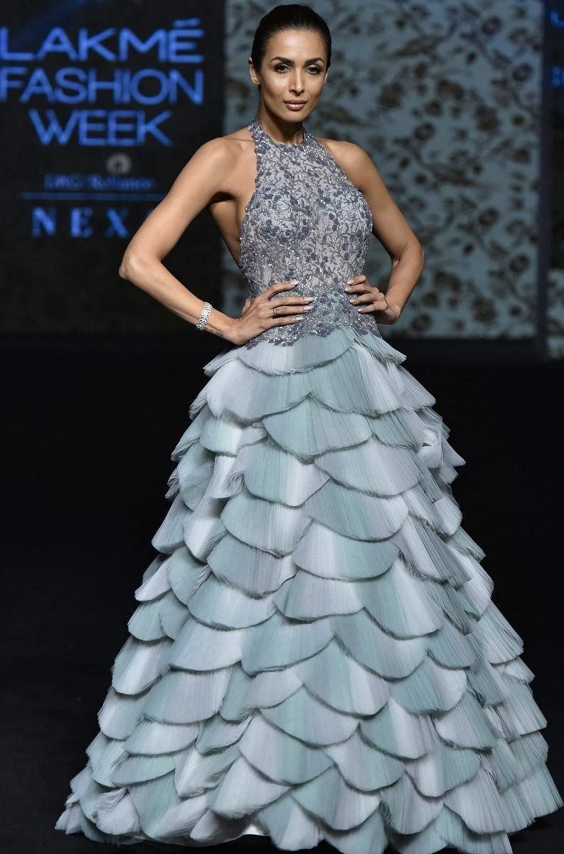 Mumbai: Bollywood actress Malaika Arora showcases a creation by designer Manoj Agarwal at the Lakmé Fashion Week (LFW) Summer Resort 2019, in Mumbai, Saturday, Feb 2, 2019. (PTI Photo)