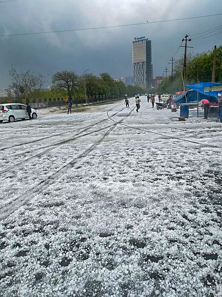 A view of a street after hailstorm struck various parts of Noida, Thursday, Feb 7, 2019. (PTI Photo)