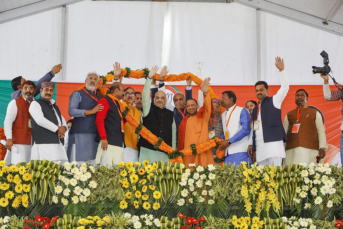BJP President Amit Shah, Uttar Pradesh Chief Minister Yogi Adityanath and other leaders during Booth President's Conference for Gorakhpur Zone, in Maharajganj, Friday, Feb 08, 2019. (Handout Photo)