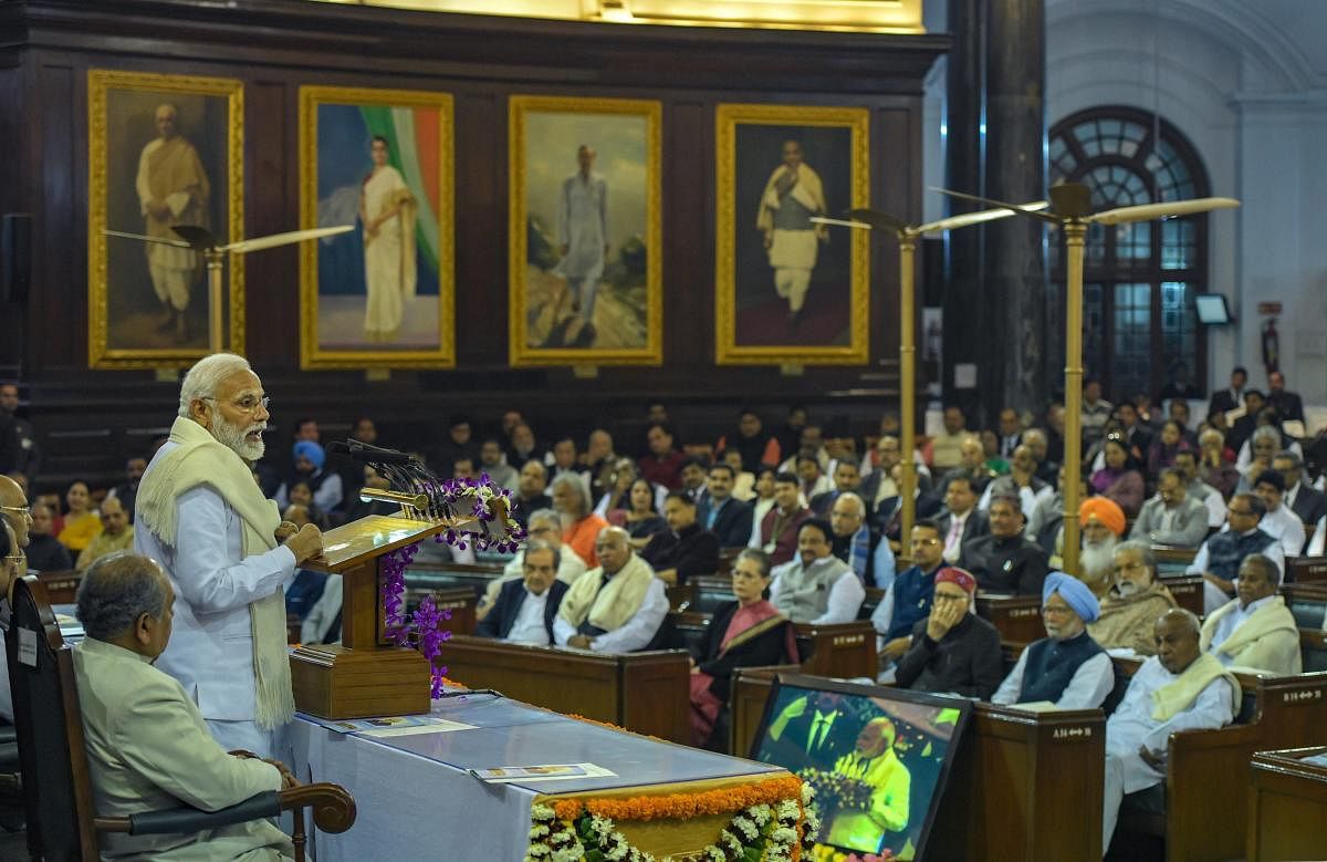 Prime Minister Narendra Modi addresses an event to unveil a life-size portrait of former prime minister Atal Bihari Vajpayee at the Central Hall of Parliament House, in New Delhi, Tuesday, Feb 12, 2019. (PTI Photo/Vijay Verma)