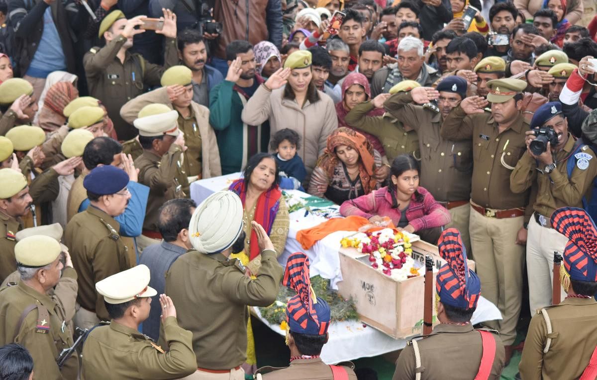 Bereaved family members of CRPF martyr Pradeep Kumar, who lost his life in Thursday's Pulwama terror attack, pay last respects in Kannauj on Saturday9. (PTI Photo)