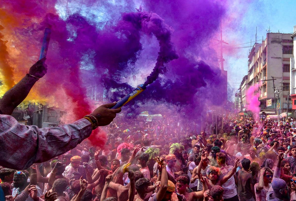 People play with colours on the occasion of Holi festival celebrations, in Guwahati, Thursday, March 21, 2019. (PTI Photo)