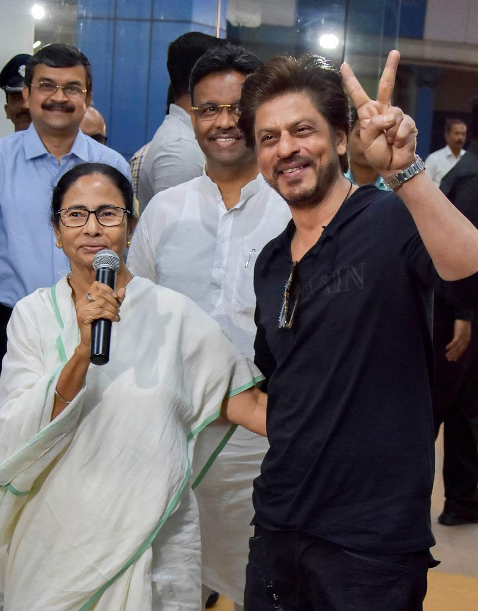 Bollywood actor Shah Rukh Khan meets West Bengal Chief Minister Mamata Banerjee at CM's office, in Nabanna, in Howrah, Tuesday, March 26, 2019. (PTI Photo)