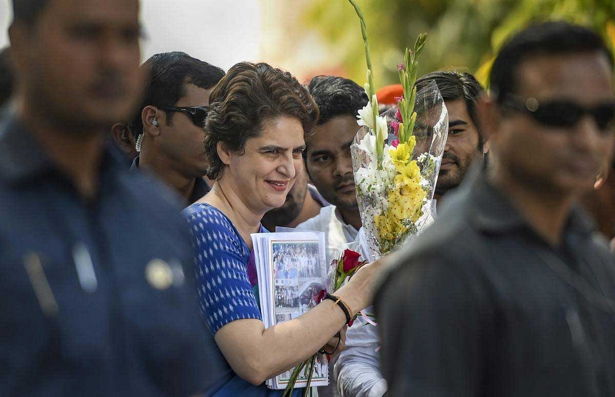 Congress General Secretary UP-East Priyanka Gandhi Vadra is greeted by party leaders and workers on her arrival at the airport, in Lucknow, Wednesday, March 27, 2019. Priyanka Gandhi is on a three-day visit to Amethi, Rae Bareli and Faizabad for her next leg of campaigning in Uttar Pradesh. (PTI Photo)