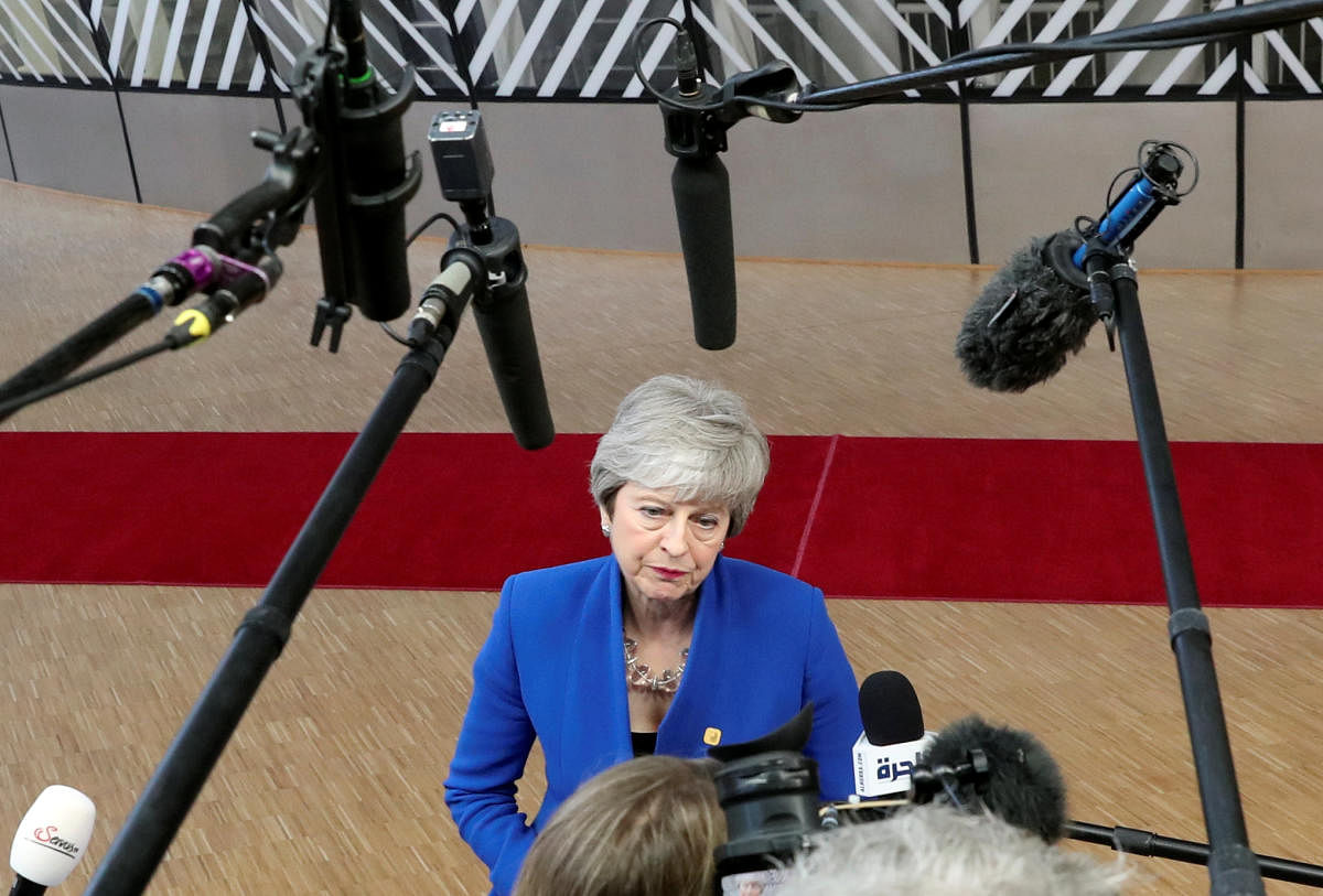 Britain's Prime Minister Theresa May speaks to the media as she arrives at an extraordinary European Union leaders summit to discuss Brexit, in Brussels, Belgium April 10, 2019. REUTERS