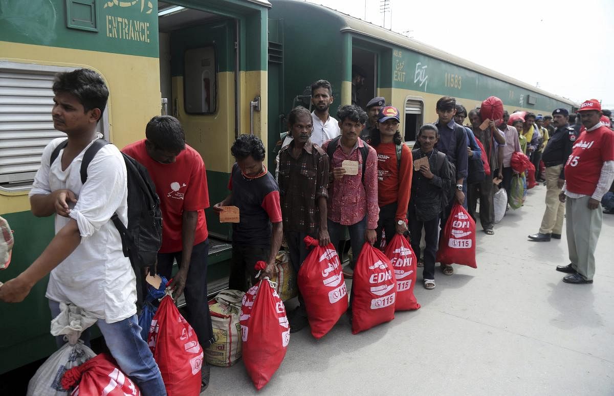 Released Indian fishermen line up to leave for their country, at Lahore railway station in Pakistan, Monday, April 15, 2019. Pakistani officials said they released 100 Indian prisoners detained for fishing illegally in the country's territorial waters in the Arabian sea. AP/PTI