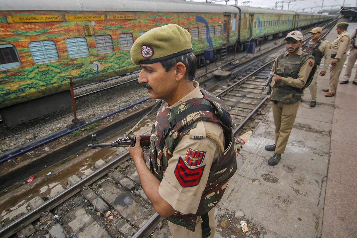 Security personnel stand guard at Jammu railway station in Jammu, Wednesday, April 17, 2019. Security in Jammu and Kashmir has been beefed for the 2nd phase of Lok Sabha elections. PTI