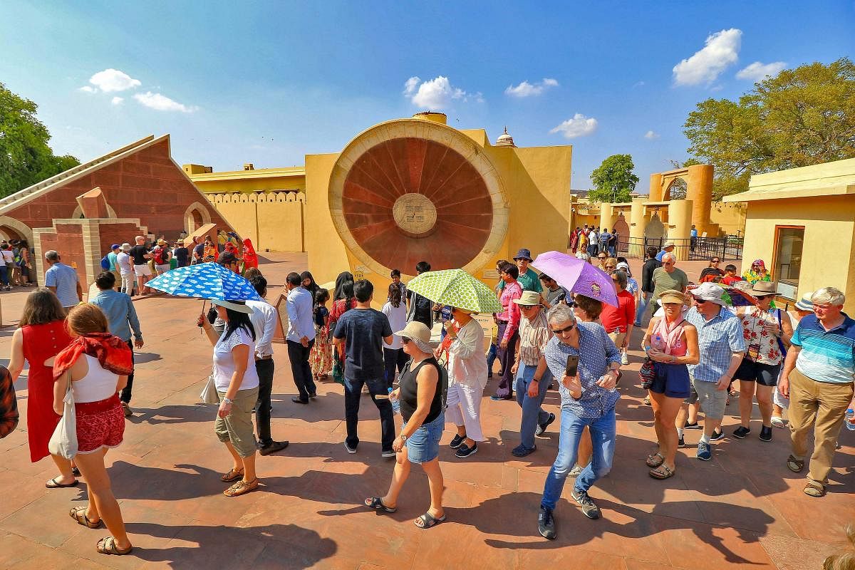 Jaipur: Foreigners and local tourist visit historical Jantar Mantar on the occasion of International Day For Monuments and Sites, in Jaipur, Thursday, April 18, 2019. PTI