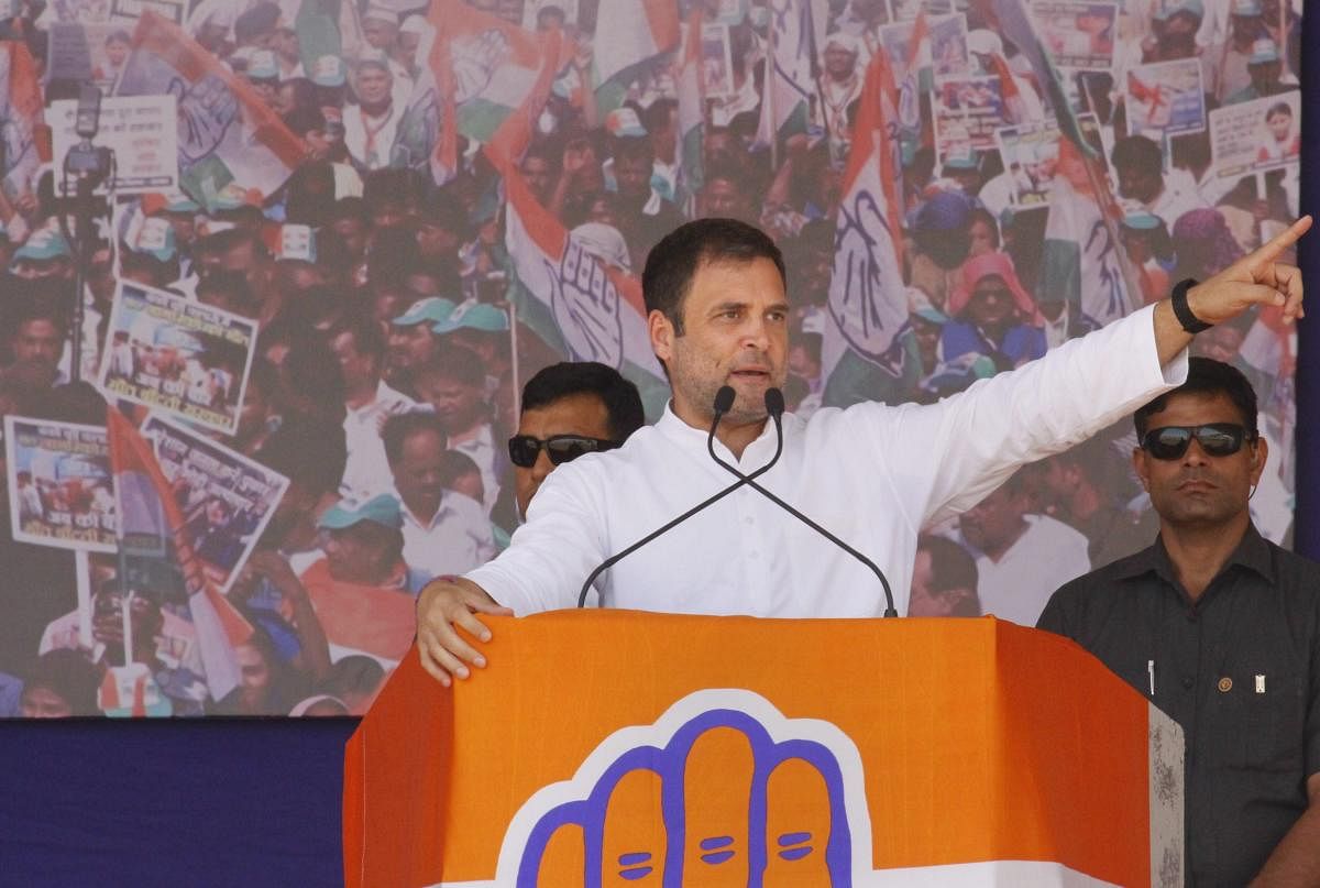 Congress President Rahul Gandhi addresses an election campaign rally for the General Elections 2019 in Bajipura village of Tapi district of Gujarat, Friday, April 19, 2019. (PTI Photo)