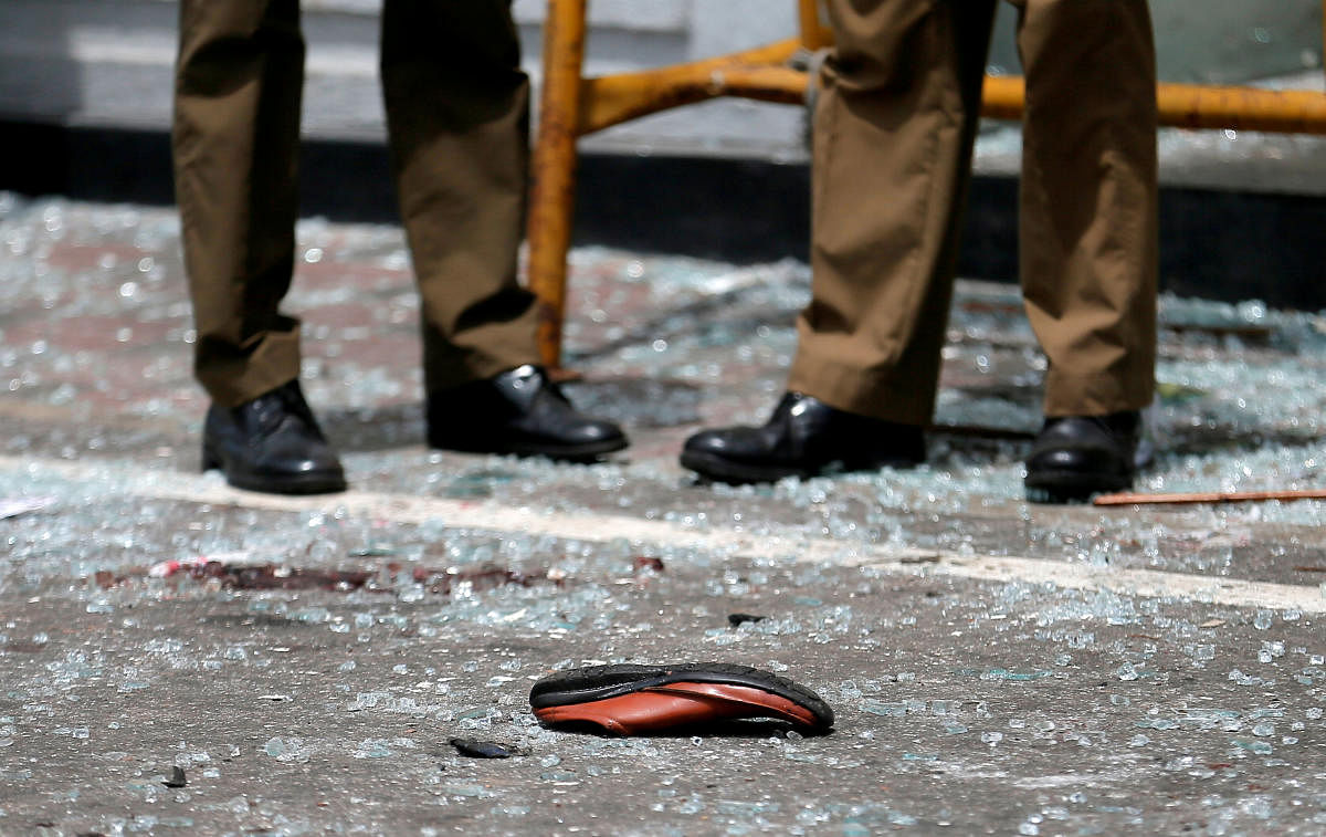A shoe of a victim is seen in front of the St. Anthony's Shrine, Kochchikade church after an explosion in Colombo, Sri Lanka April 21, 2019. REUTERS/Dinuka Liyanawatte