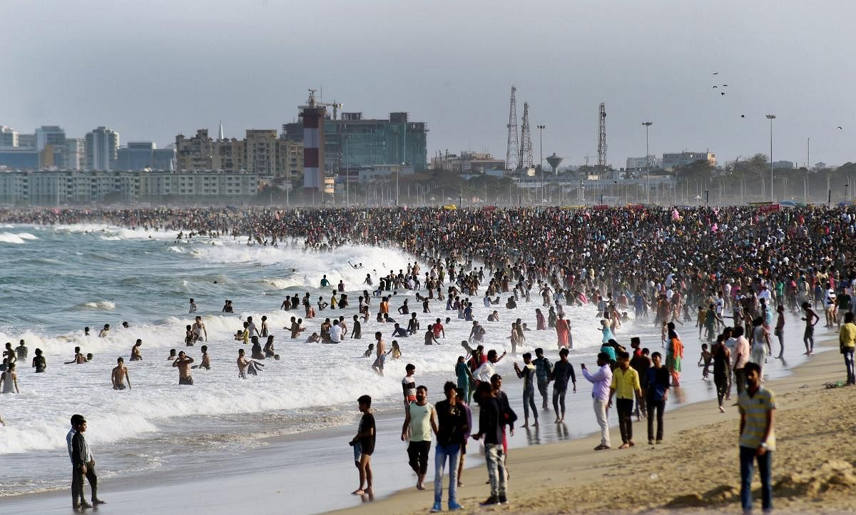 People enjoy at Marina beach on a hot summer day, in Chennai, Sunday, April 21, 2019. (PTI Photo)